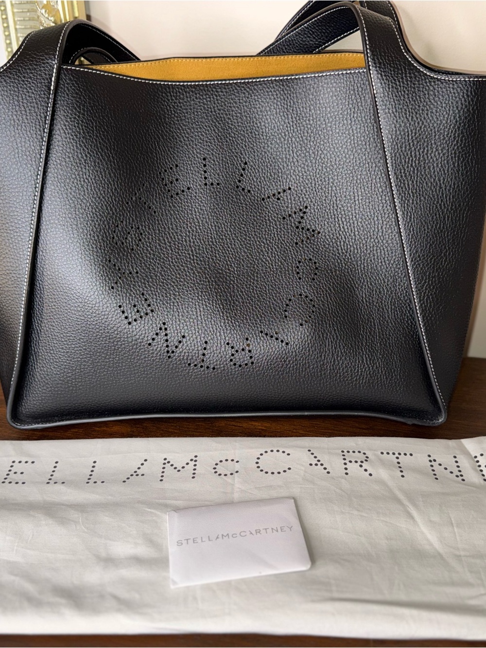 Stella McCartney Black Vegan Leather Perforated Logo Tote with Mustard Interior - Picture 9 of 12